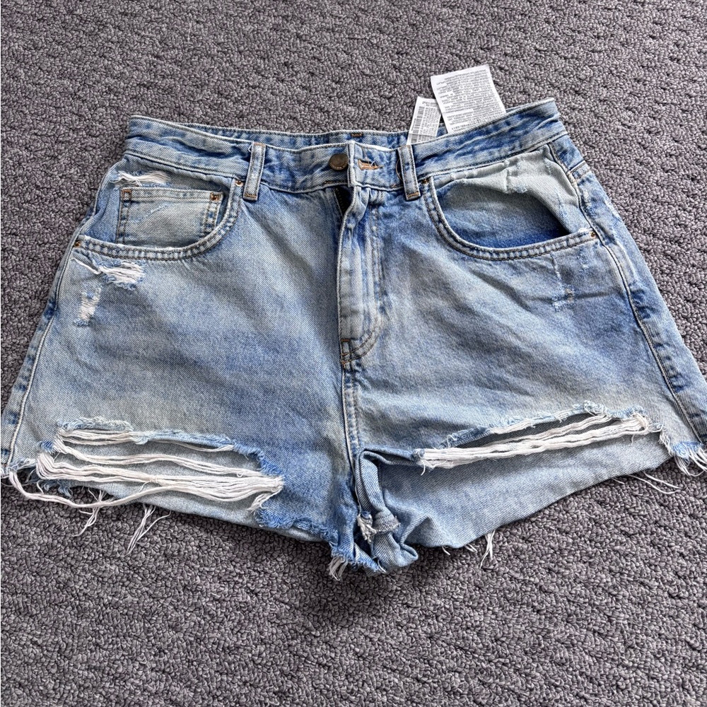 Women’s mid rise distressed shorts